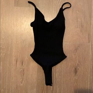 Black ribbed spaghetti strap body suit